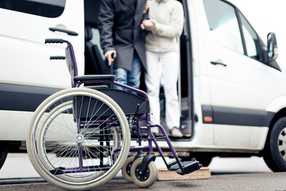 Transport malade assis près de Aubiet